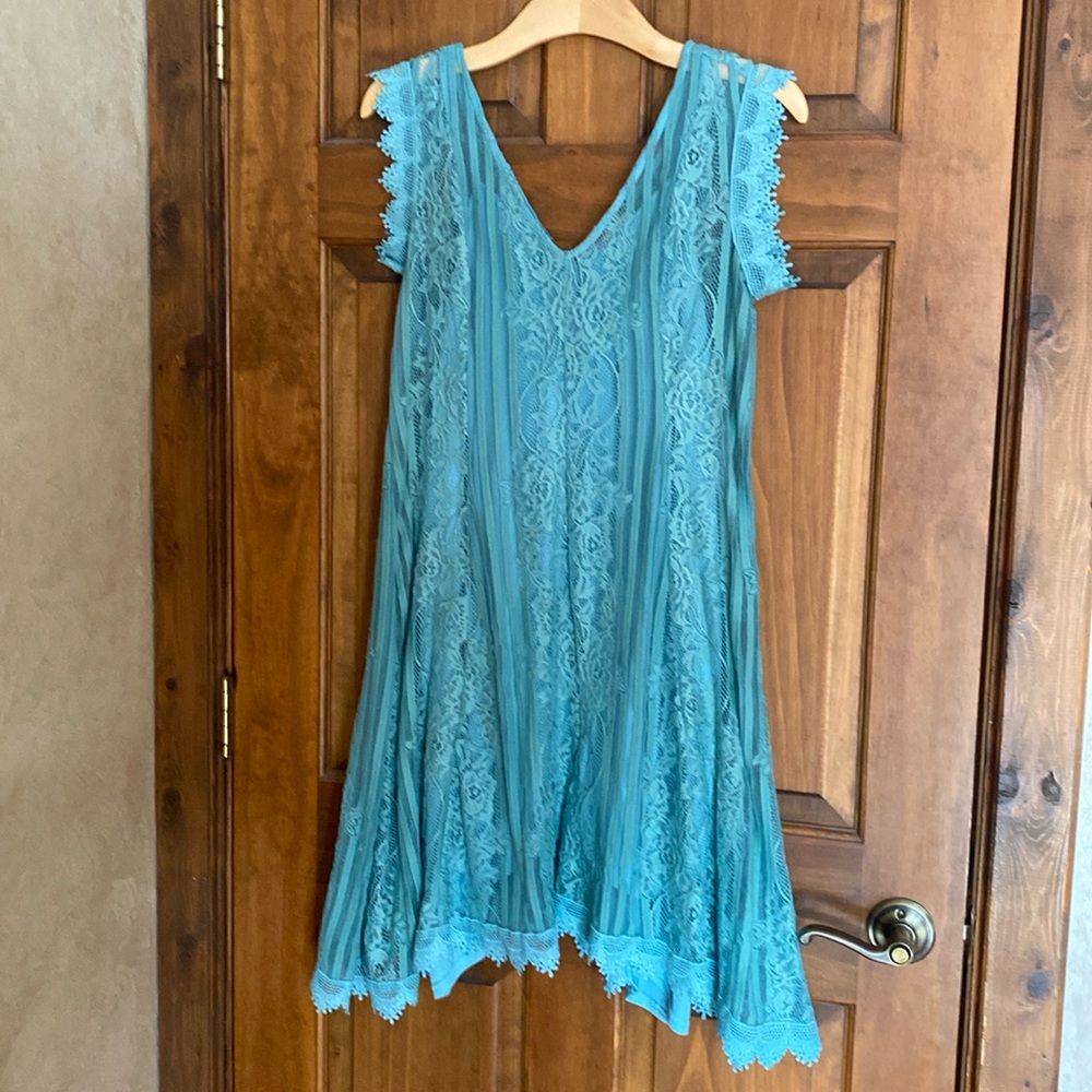 Altard state size medium 
Teal blue